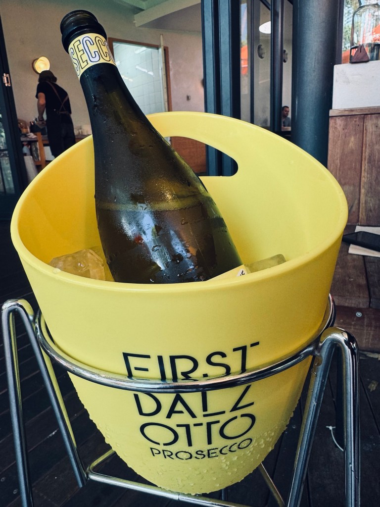Prosecco in yellow ice bucket